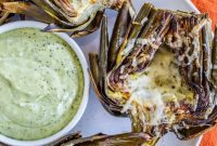 Garlic-Kissed Roasted Artichokes with Zesty Pesto