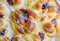 Tear and Share Raspberry Buns with Coconut Glaze