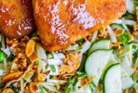 Crispy Fish atop Zesty Asian Slaw