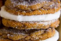 Warm Ginger Molasses Sandwich Cookies with Fluffy Buttercream