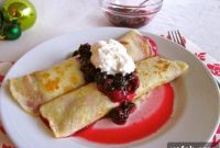 Delicate Cranberry Curd Crepes with Sweet Berries and Whipped Cream