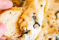 Ultimate Cheesy Spinach Artichoke Dip