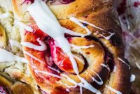Tropical Raspberry Buns with Dreamy Coconut Frosting