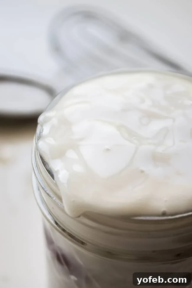 Aloha Coconut Pancake Syrup 5 a jar of homemade coconut syrup.