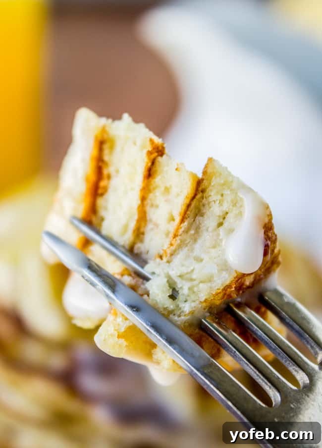 Golden Macadamia Banana Pancakes 6 Plate of Banana Macadamia Pancakes with a generous drizzle of coconut syrup