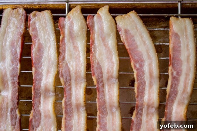 Savory Puffy Bacon Twists with Zesty BBQ Ranch 4 Close-up of baked Puffy Bacon Twists on a baking sheet