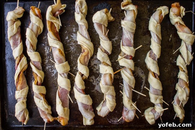 Savory Puffy Bacon Twists with Zesty BBQ Ranch 7 Cooked Puffy Bacon Twists cooling on a rack