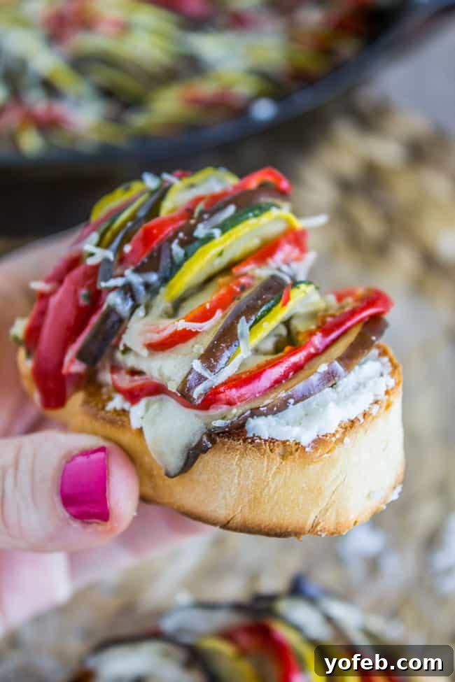 Sun-Kissed Vegetable Bake 7 bite of ratatouille on top of toasted baguette slice.