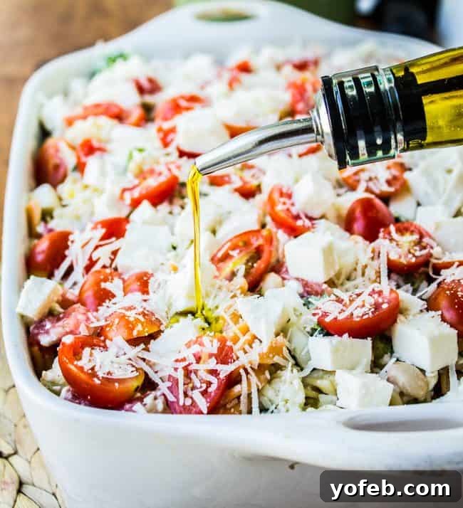 Sun Kissed Tomato Basil Bake 5 drizzling olive oil on summer veggie pasta bake.