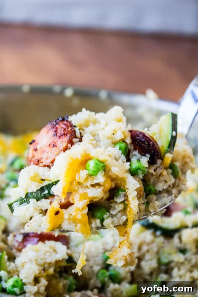 Smoky Kielbasa and Zucchini Cauliflower Rice Skillet 3 Close-up of Cauliflower Rice Skillet with perfectly cooked Zucchini and Kielbasa