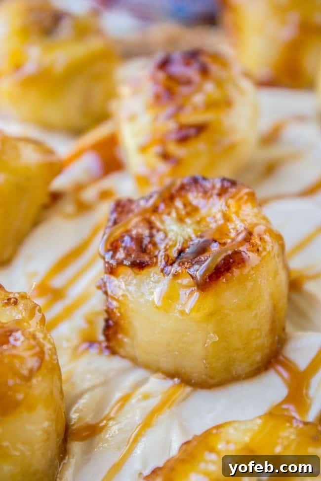 No Bake Salted Caramel Cheesecake with Caramelized Bananas from The Food Charlatan. This easy no bake salted caramel cheesecake has such amazing flavor! Caramelized bananas, hello. The almond crust lends great texture and means that this dessert is gluten free! #cheesecake #nobake #saltedcaramel #caramel #bananas #easy No Bake Cheesecake
