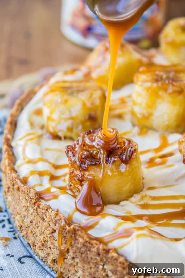 No Bake Salted Caramel Cheesecake with Caramelized Bananas from The Food Charlatan. This easy no bake salted caramel cheesecake has such amazing flavor! Caramelized bananas, hello. The almond crust lends great texture and means that this dessert is gluten free! #cheesecake #nobake #saltedcaramel #caramel #bananas #easy #glutenfree Salted Caramel Cheesecake