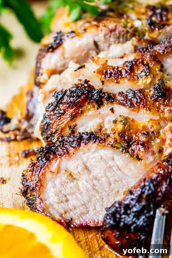 Reliving 2015 The Food Charlatan's Top 5 Culinary Hits 3 Cuban Mojo Marinated Pork (Lechon Asado) from The Food Charlatan, showcasing tender, flavorful roasted pork.