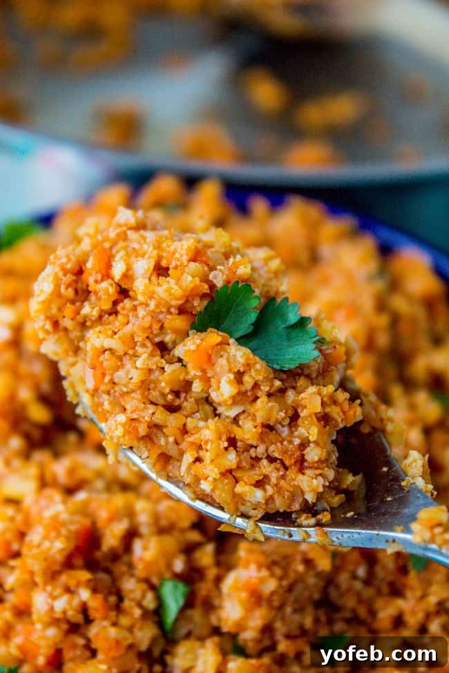 Spanish Cauliflower Rice for Your Mexican Feast 4 Close up of delicious Spanish Cauliflower Rice in a bowl, ready to serve