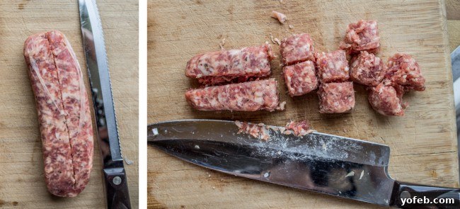 Effortless Slow Cooker Pasta Sauce 8 Cutting Italian sausage up on a wooden cutting board.