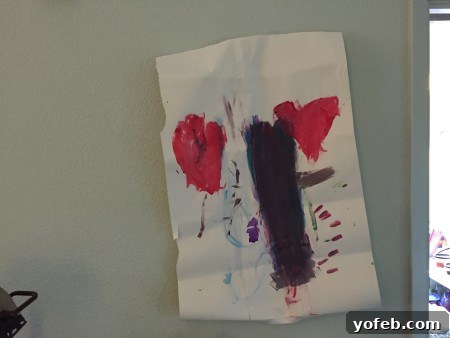Creamy Chicken Pesto Lasagna 5 A child's drawing, 'Tree Stump and Throbbing Heart,' taped crookedly on a wall