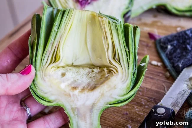 Garlic-Kissed Roasted Artichokes with Zesty Pesto 11 Artichoke halves ready for seasoning