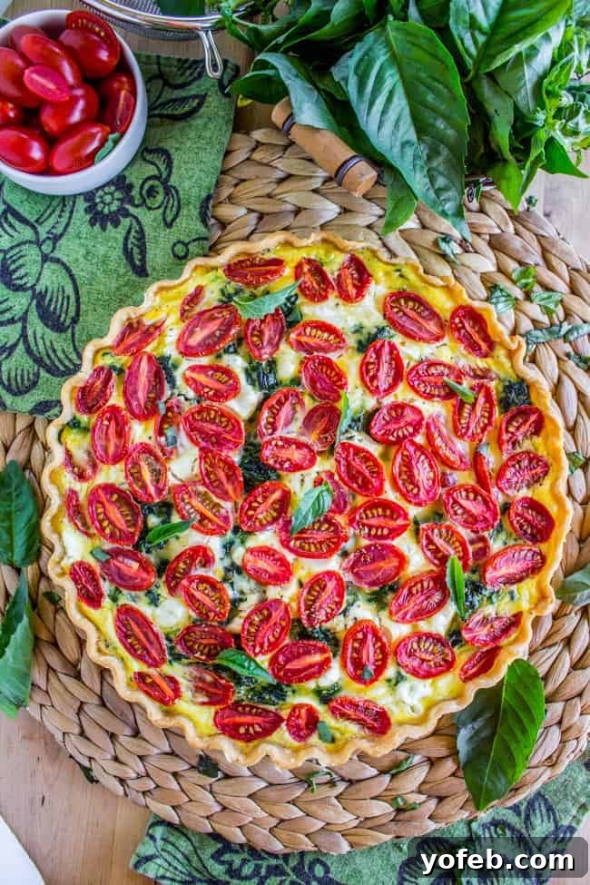 Farmers Market Quiche with Cherry Tomatoes Leeks and Spinach 3 Close-up of Cherry Tomato, Leek, and Spinach Quiche showing vibrant ingredients.