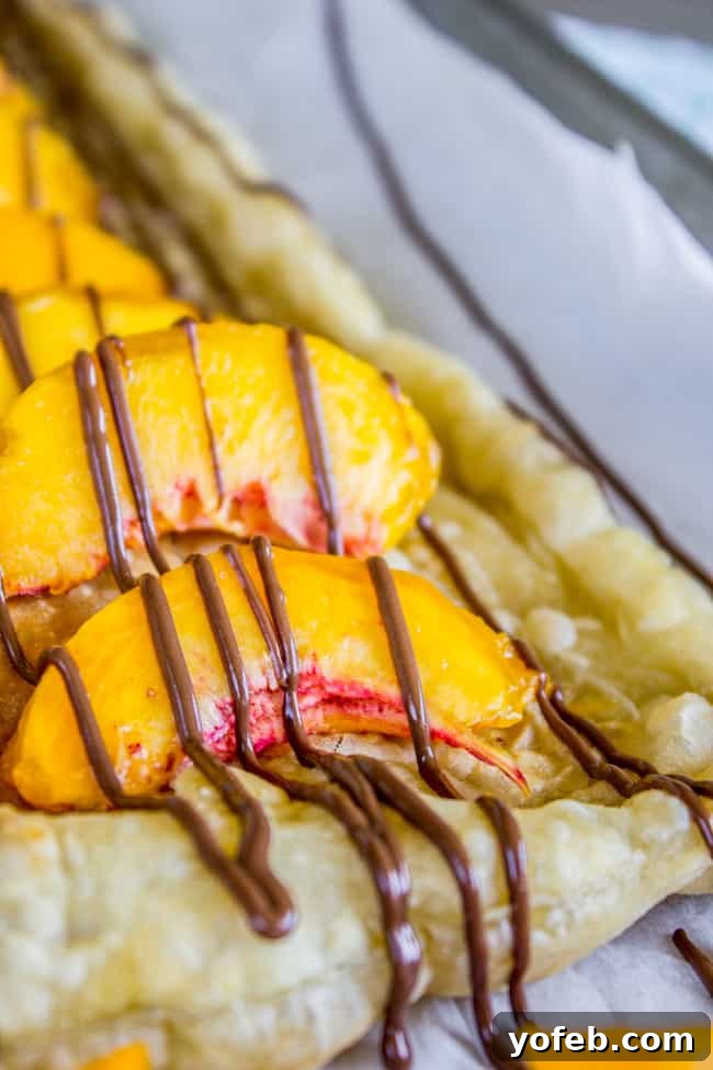 Peachy Nutella Pockets 5 Close-up of fresh, ripe peaches, ready for baking or eating.