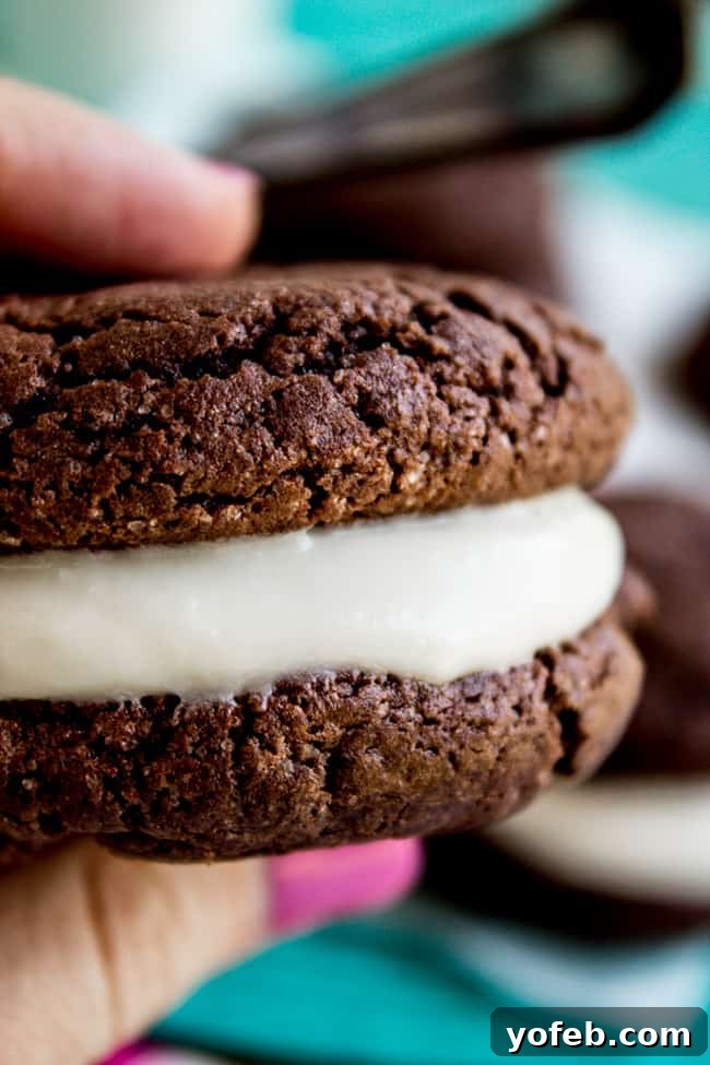 Homemade Cake Mix Oreos with Cream Cheese Filling 5 Stack of homemade Oreo cookies with creamy white filling