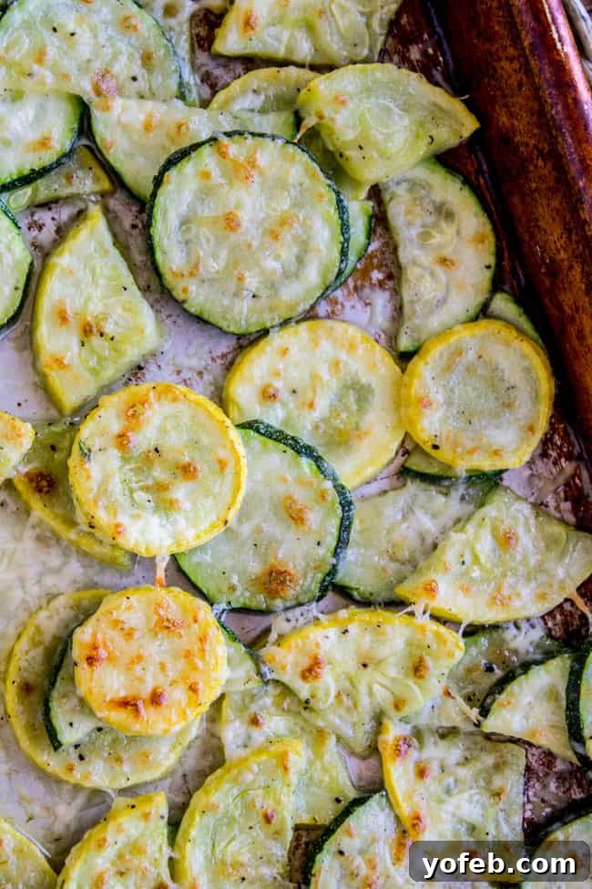 Golden Parmesan Zucchini Bake 7 Parmesan zucchini and squash on a pan.
