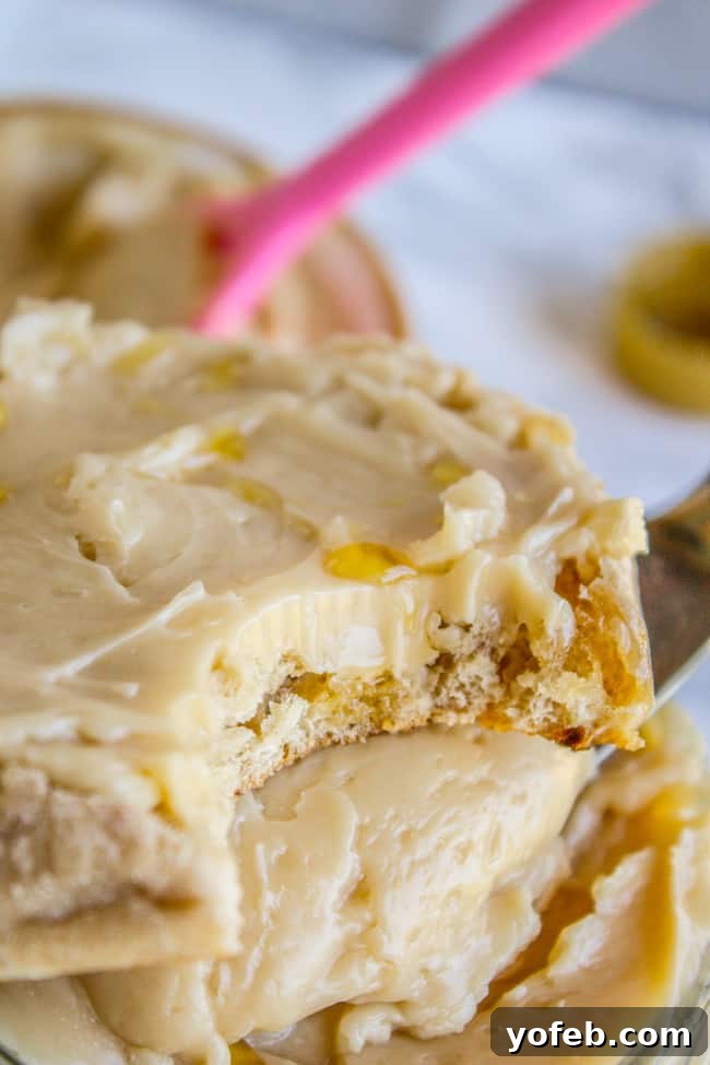 Quick Whipped Maple Butter 5 Maple butter spread generously on a warm, golden baked good, ready to be enjoyed.