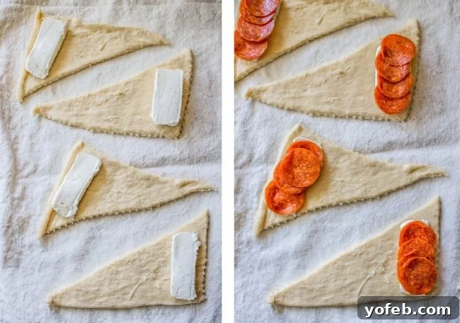 Close-up of Pepperoni Cream Cheese Crescent Rolls being prepared, with cream cheese spread on crescent dough.