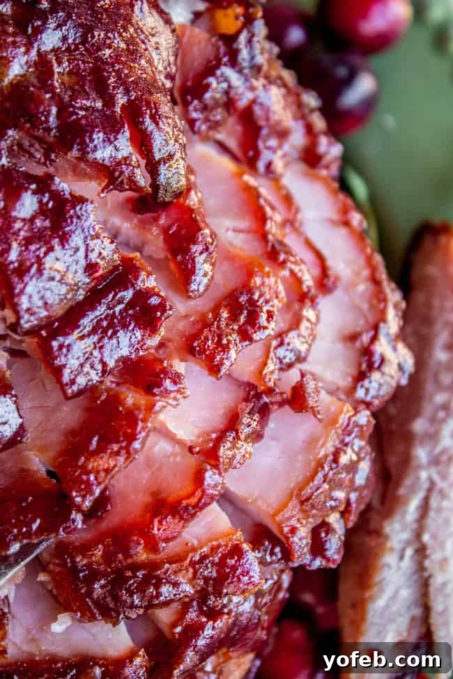 Succulent Roasted Ham with Sweet and Tangy Cranberry Dijon Glaze 6 How to glaze a ham-close up shot, sliced