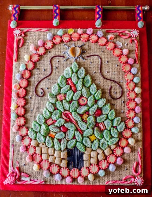 Vintage Style Candy Christmas Tree Craft. Learn how to make your own Candy Christmas Tree craft to deck the halls this year! Get some felt and burlap and a TON of old fashioned candy and start glueing away. My mother-in-law still has the one she made 30 years ago! #christmas #tree #candy #oldfashioned #homemade #christmastree #holidays #candycrafts Vintage Style Candy Christmas Tree Craft