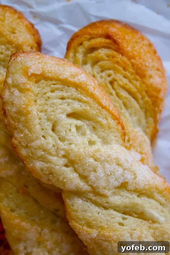 Swedish Layered Sour Cream Twists 2 close up of the layers in swedish sour cream twist cookies, showcasing their flaky texture.