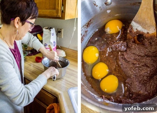 Nana's Legendary Fudgy Brownies 6 Brownie batter being mixed with flour and eggs, highlighting the smooth texture.