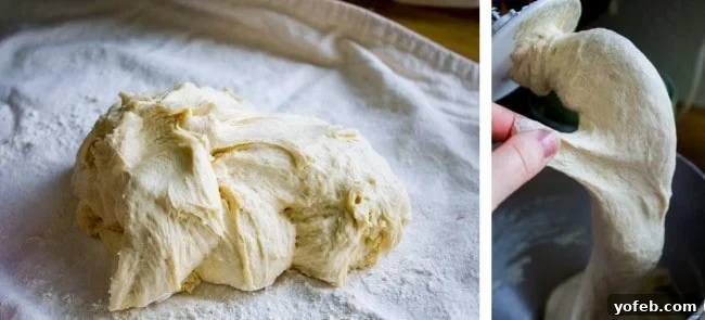 One Hour French Bread from The Food Charlatan. This delicious yeasty French bread recipe has only one 20-minute rise before going into a screaming hot oven for another 20 minutes. At the end you have golden crusty goodness just waiting to be slathered in butter or dipped in oil and balsamic! One hour, I promise!! #french #bread #homemade #easy #ideas #baguette #quick Hands kneading bread dough on a lightly floured tea towel, demonstrating the process of testing the dough's elasticity for perfect texture.