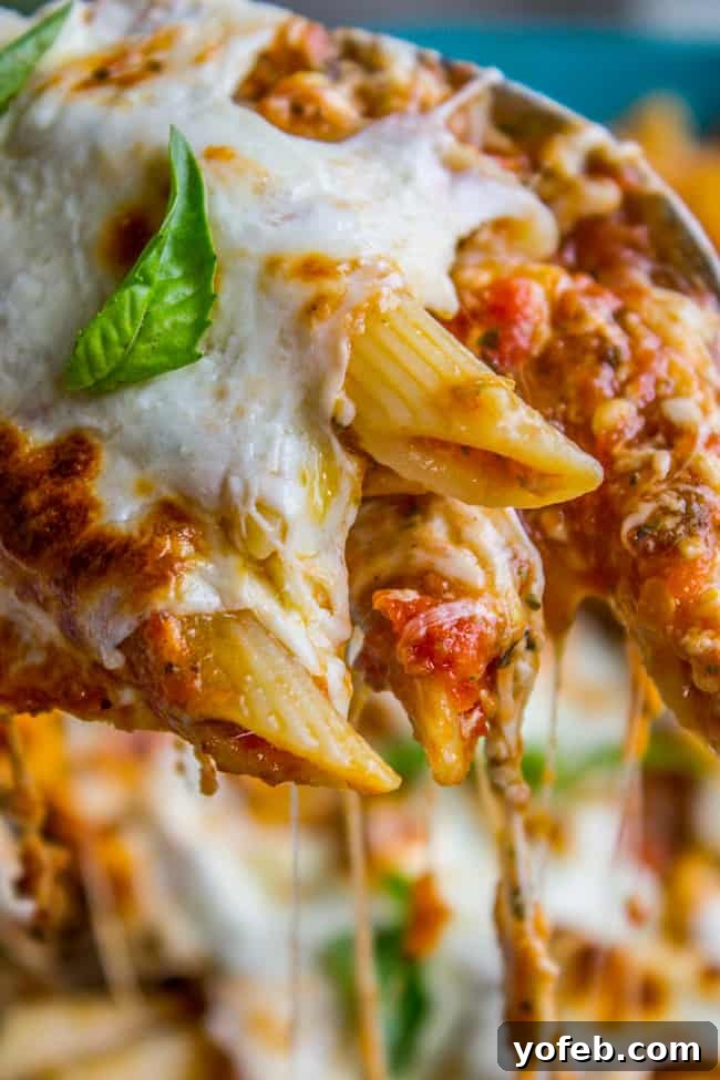 Supreme Cheesy Penne and Mozzarella Bake 4 Close-up of the delicious Penne and Mozzarella Casserole, showing off the melted cheese
