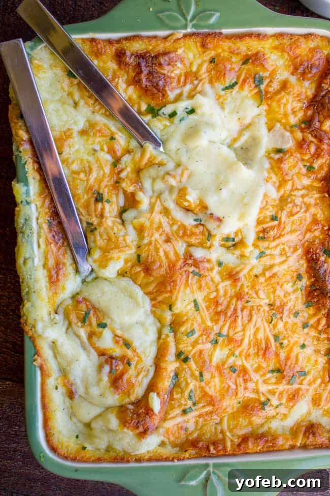 Ultra Creamy, Cheesy, MAKE AHEAD Mashed Potatoes from The Food Charlatan