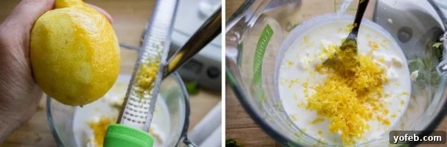 Zesty Lemon Herb Coleslaw 11 A hand using a microplane grater to zest a lemon directly into a measuring cup containing the liquid ingredients for coleslaw dressing.
