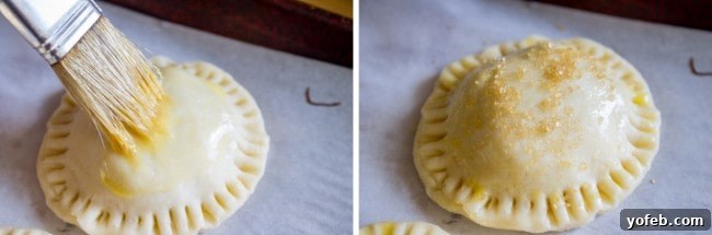 Handheld Chocolate Cherry Delights 11 Brushing egg wash on hand pies