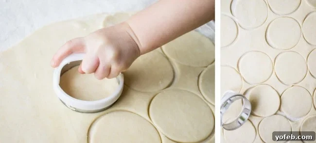 Handheld Chocolate Cherry Delights 8 Crimping the edges of a hand pie with a fork