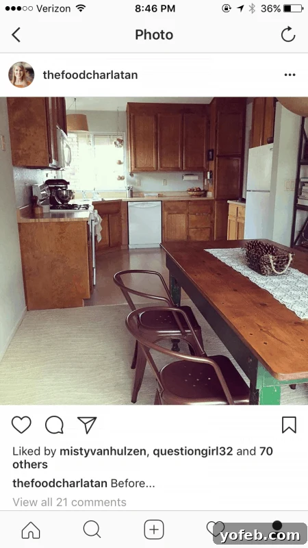 Before shot of a kitchen during home renovation, showing old cabinets.