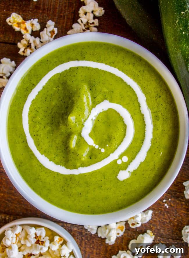 Zucchini Velvet with a Pop of Corn 10 Creamy zucchini soup finished with a swirl of cream and a handful of popcorn.