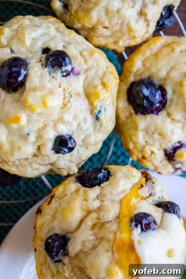 Homemade Pancake Muffins 3 A close-up of a stack of fluffy Blueberry Buttermilk Pancake Muffins, perfect for a hearty breakfast.