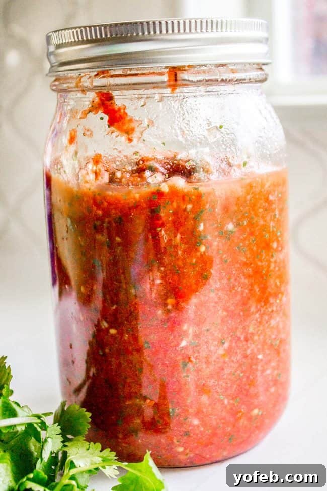 Salsa in 5: Restaurant Flavor for Your Best Taco Tuesday Yet 5 Homemade salsa stored in a mason jar.