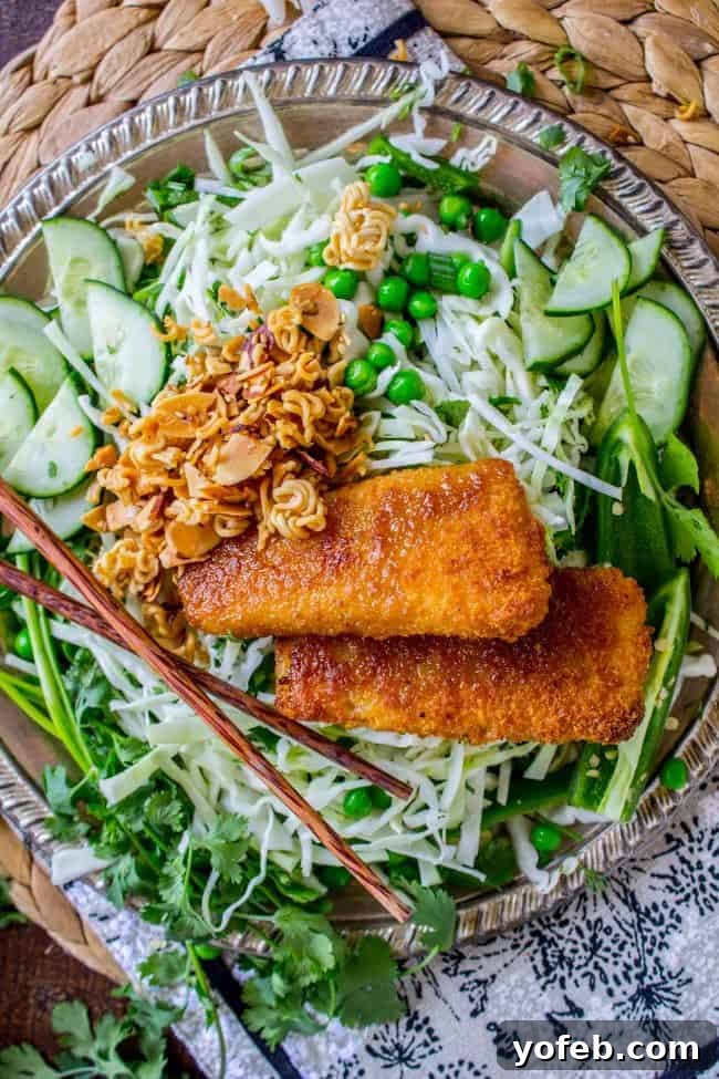 Crispy Fish atop Zesty Asian Slaw 6 The vibrant Crunchy Asian Cabbage Salad, dressed and ready to serve.