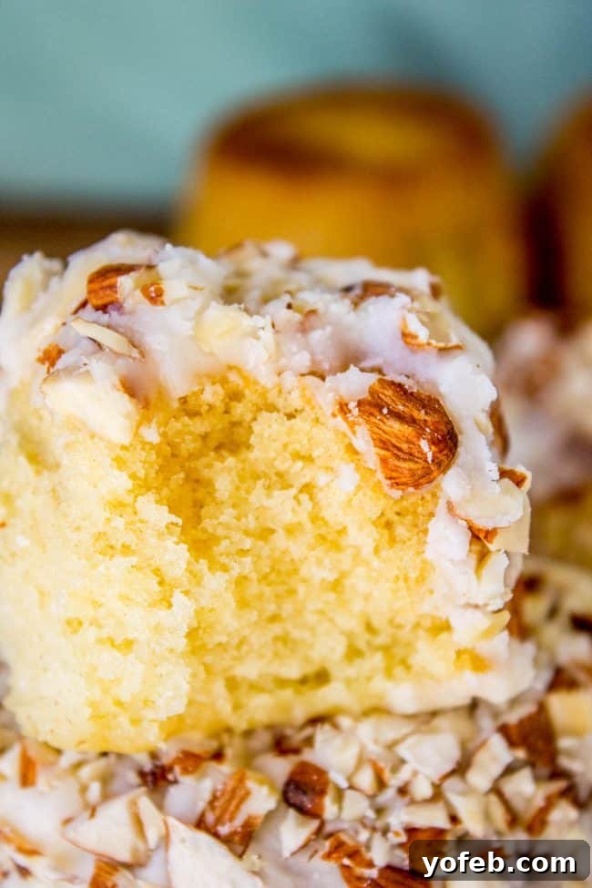 Crispy Almond Upside Down Cupcakes 3 Perfectly frosted Upside Down Almond Crunch Cupcakes with a delightful almond topping