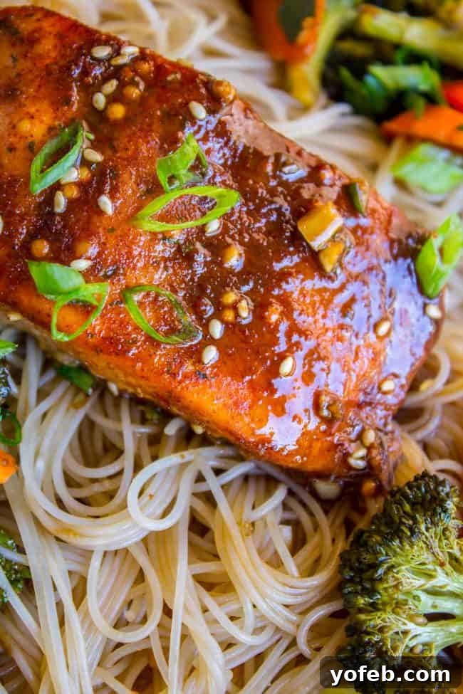 One Pan Asian Sesame Salmon with Noodles and Roasted Veggies 4 Asian-inspired chili spiced salmon fillets ready for roasting
