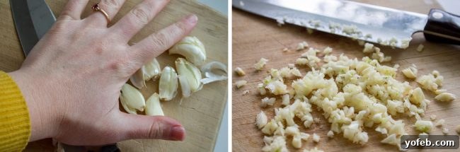 Preparing fresh minced garlic, essential for the signature flavor of garlic knots. Fresh garlic cloves being smashed and finely minced for the garlic butter sauce.