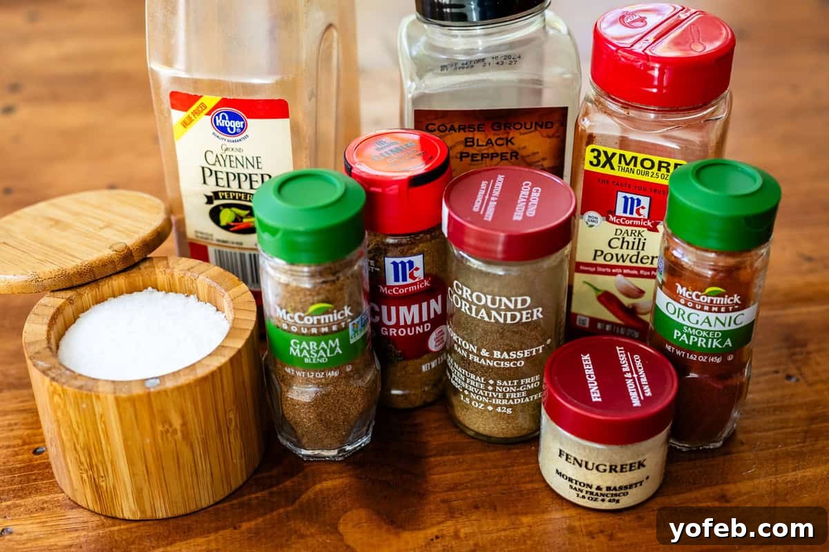 Chicken Tikka Masala A Culinary Revelation 5 spices for Chicken tikka masala on a table, like garam masala, coriander, cumin, etc.