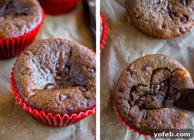 Cutting out heart shapes from the center of Valentine's Day Cupcakes.