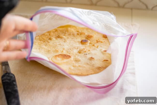 Roti Buttery Indian Flatbread Perfection 22 roti bread steaming in a ziplock bag with paper towels.