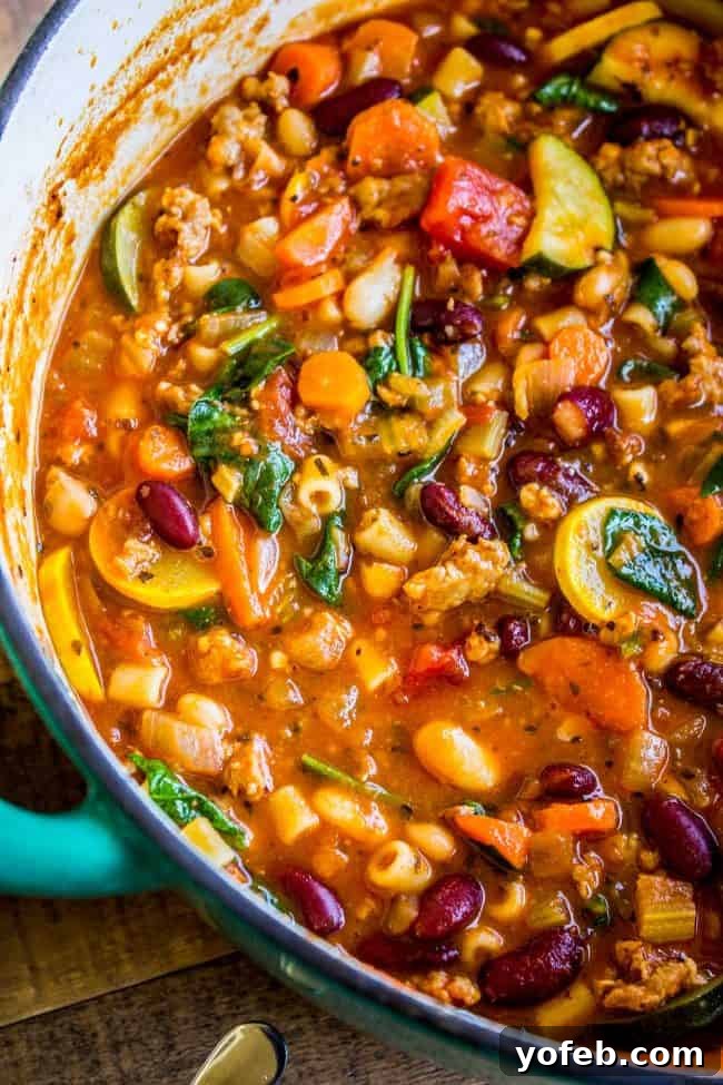 Hearty Sausage and Pesto Minestrone 5 minestrone with sausage in a stock pot.