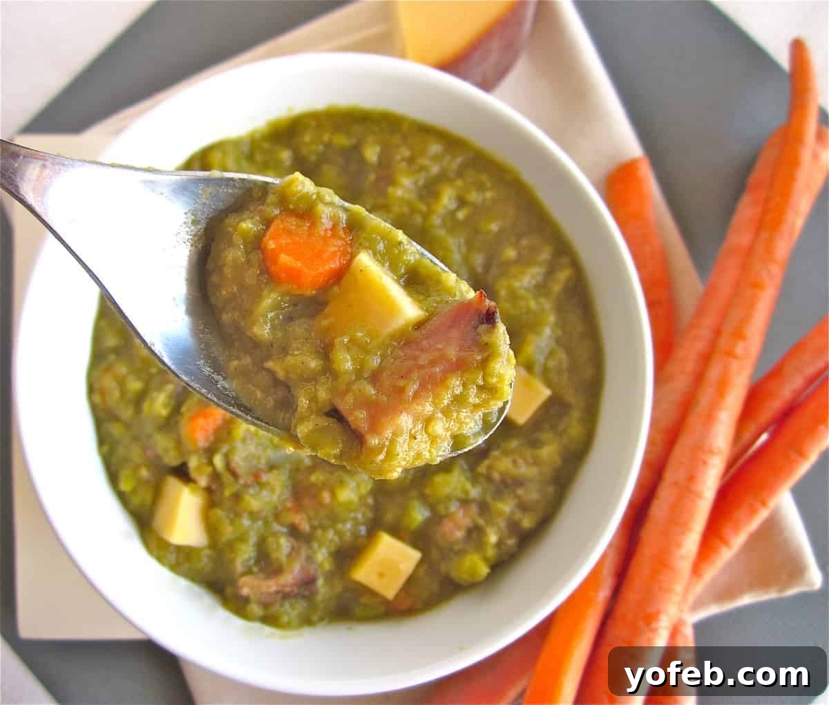 IMG_3035 An older, less professionally styled but still appealing photo of a bowl of split pea soup with ham, showing the evolution of food photography.